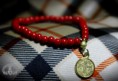 Turquesina roja con medalla con Chapada en Oro